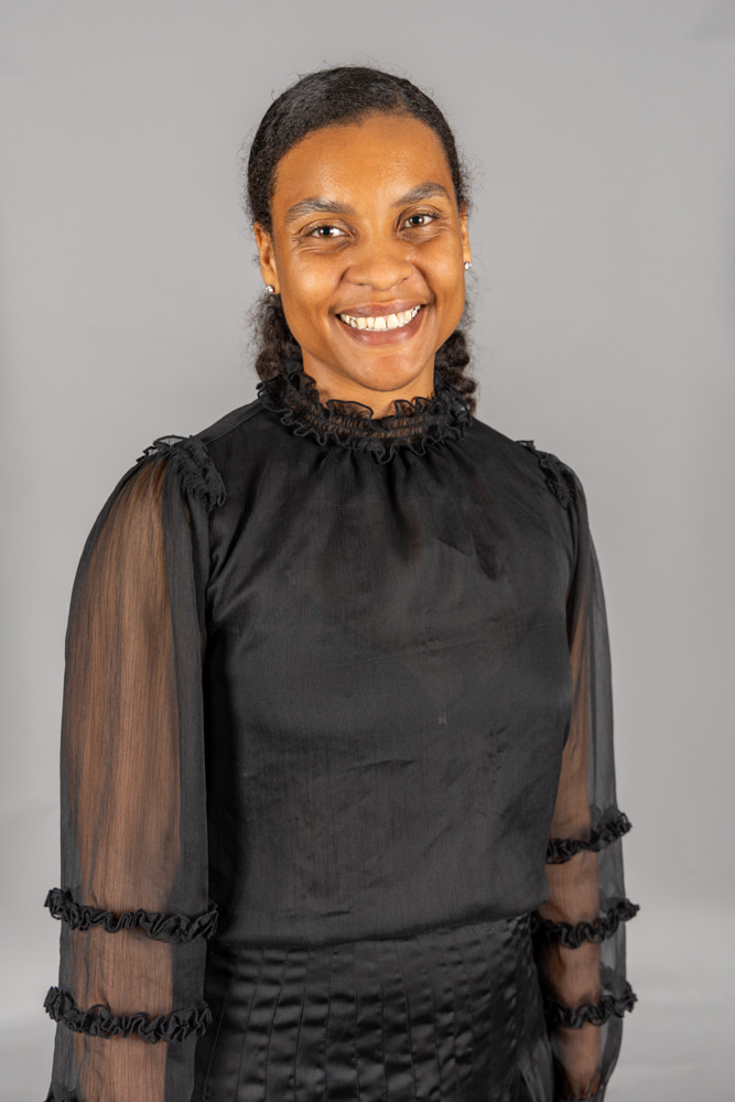 Nia Barberousse Binns, Esq.